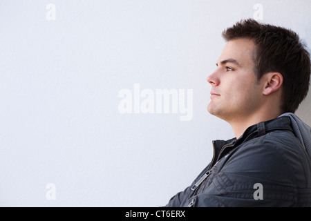 Thoughtful young man isolated on white background Stock Photo