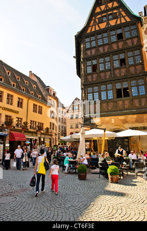 Place de La Cathedrale,Surrounding Strasbourg Cathedral, Tourists, Restaurants, Cafes,Strasbourg,France Stock Photo