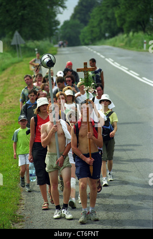 A group of pilgrims on a country road, Slovakia Stock Photo