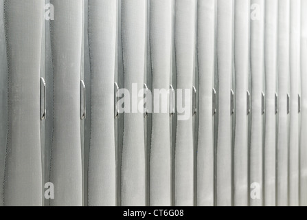 Abstract image of modern high tech internet data center room with rows of racks with network and server hardware. Stock Photo