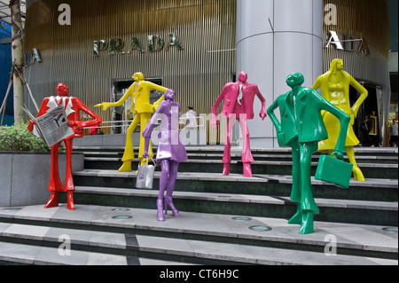 'Urban People' by Swiss sculptor Kurt Laurenz Metzler, ION Orchard, Orchard Road, Singapore, Southeast Asia. Stock Photo