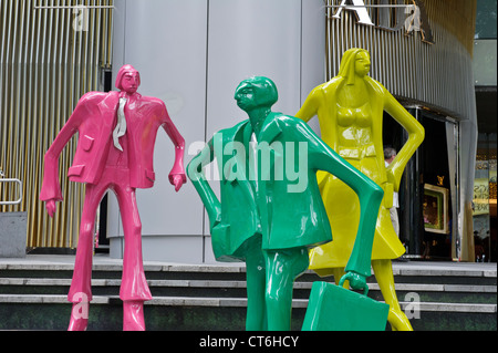 'Urban People' by Swiss sculptor Kurt Laurenz Metzler, ION Orchard, Orchard Road, Singapore, Southeast Asia. Stock Photo