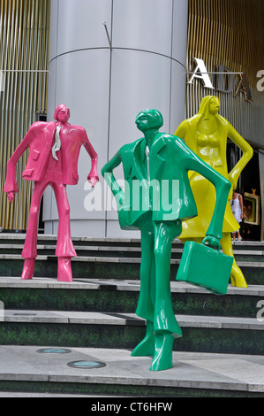 'Urban People' by Swiss sculptor Kurt Laurenz Metzler, ION Orchard, Orchard Road, Singapore, Southeast Asia. Stock Photo