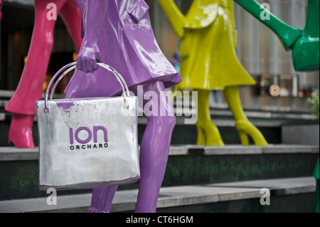 'Urban People' by Swiss sculptor Kurt Laurenz Metzler, ION Orchard, Orchard Road, Singapore, Southeast Asia. Stock Photo