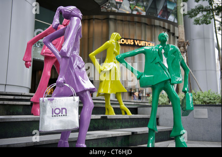 'Urban People' by Swiss sculptor Kurt Laurenz Metzler, ION Orchard, Orchard Road, Singapore, Southeast Asia. Stock Photo