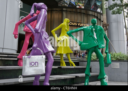 'Urban People' by Swiss sculptor Kurt Laurenz Metzler, ION Orchard, Orchard Road, Singapore, Southeast Asia. Stock Photo