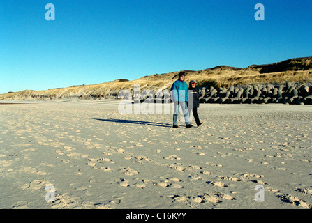 Westerland, walkers on the beach on Sylt Stock Photo