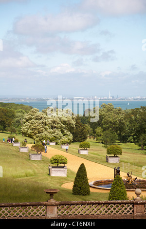 Wonderful views of Osborne House gardens with the Spinnaker Tower and Portsmouth in the distance, Cowes, Isle of Wight, UK in June - Osbourne House Stock Photo