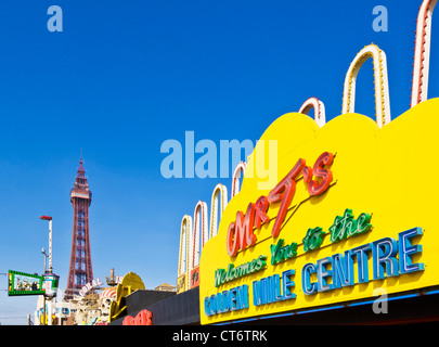 Blackpool tower and seafront amusements Mr t's Golden mile centre  along the Golden Mile on the seafront Blackpool Lancashire England GB UK EU Europe Stock Photo