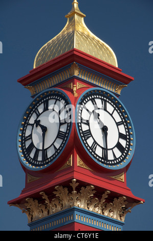 The freshly painted victorian Jubilee clock tower on Weymouth seafront was erected in 1887 to mark fifty years of Queen Victoria’s reign. Dorset, UK. Stock Photo