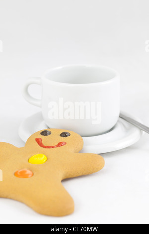 Gingerbread man with coffee cup Stock Photo