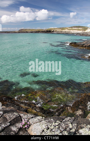 Isle of Barra, Scotland.  Picturesque view of the west coast of Barra, with Sgeir Liath in the background. Stock Photo