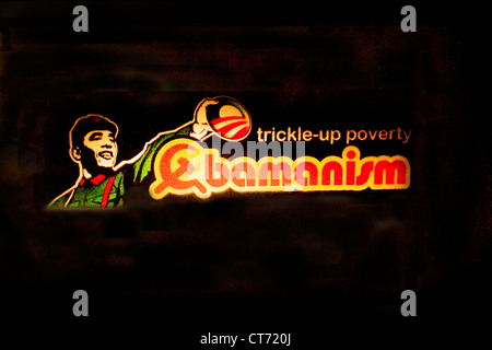 Barack Hussein Obama 'trickle-up poverty obamanism' political sticker on a car bumper. Stock Photo