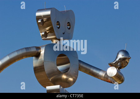 Close-up portrait of The Traveling Man, one of three stainless steel sculptures in the Deep Ellum area of Dallas, Texas. Stock Photo
