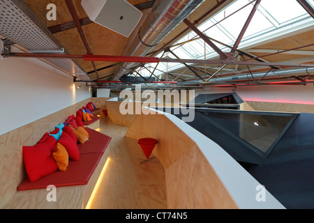 Red Bull Nederland Headquarters, Amsterdam, Netherlands. Architect: Sid Lee Architecture, 2011. Informal seating area on mezzani Stock Photo