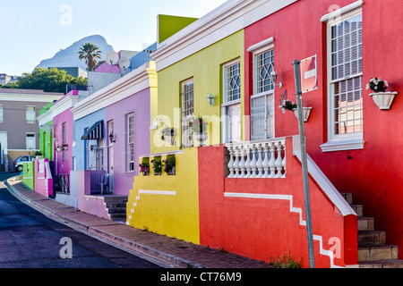 Bo-kaap terraced homes. Picturesque brightly coloured houses at base of Signal Hill, Cape town, Western Province, South Africa. Former Malay Quarter Stock Photo