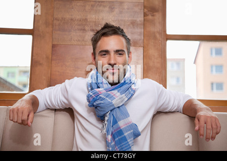 portrait of young man wearing scarf Stock Photo