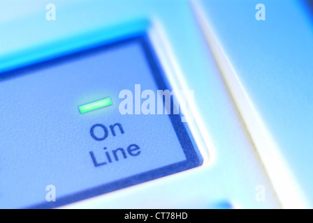 Green LED glowing online a keyboard Stock Photo
