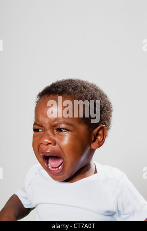 Young African boy crying Stock Photo - Alamy