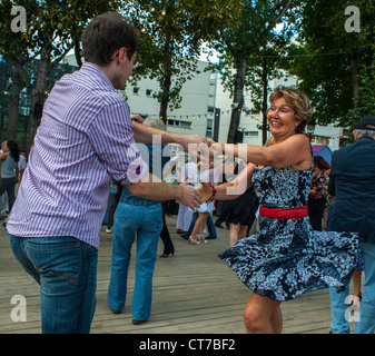 Paris, France, Public Events, Couples Swing Dancing Rock'n'Roll on River Seine plage, Quai at 'Paris Plages' . Stock Photo