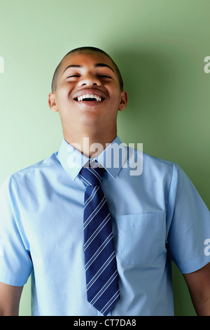 Schoolboy laughing Stock Photo