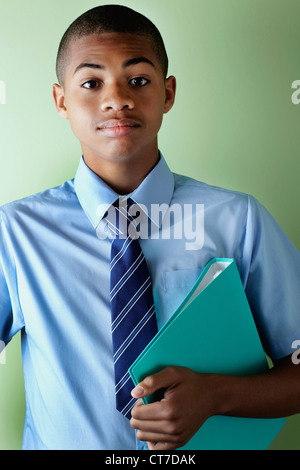 Schoolboy with ringbinder Stock Photo