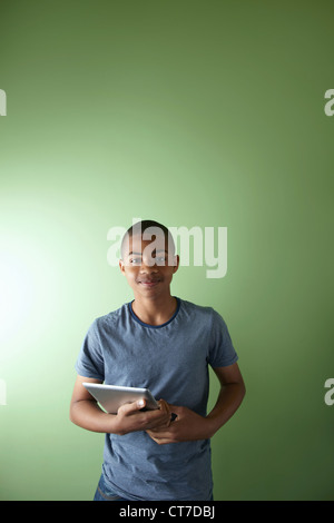 Schoolboy with digital tablet Stock Photo