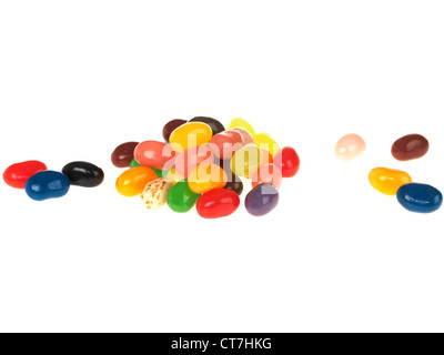Handful Of Multi-Coloured And Multi-Flavoured Authentic Traditional Jelly Beans Sweets Against A White Background With A Clipping Path and No People Stock Photo