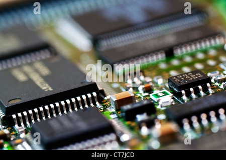 Clousep of a computer circuit board with Chips on it. Shallow depth of field. Stock Photo