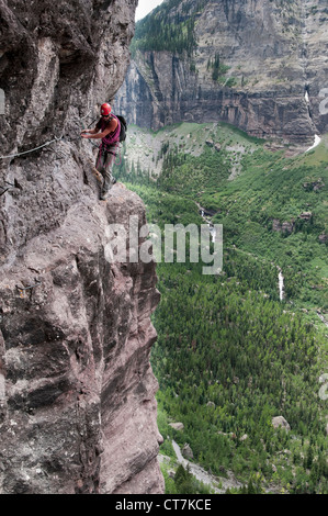 Climber tackles the Via Ferrata trail, Telluride, Colorado. Stock Photo