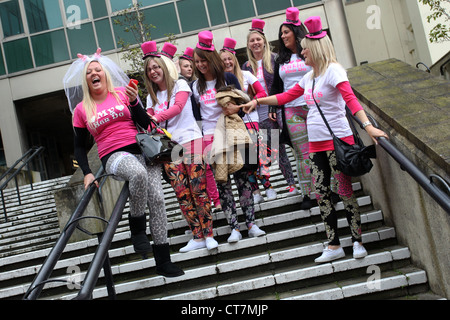 A hen party pictured partying on the start of their night out drinking in Brighton, East Sussex, UK. Stock Photo