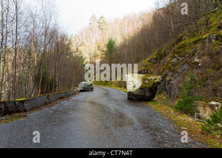 unused, run-down road in rural landscape - norway Stock Photo