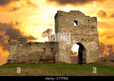 Ruined gates of cossack castle at sunset Stock Photo