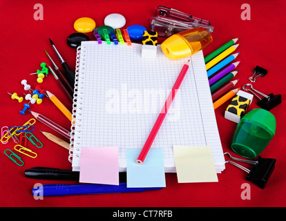 School education supplies items isolated on red background Stock Photo