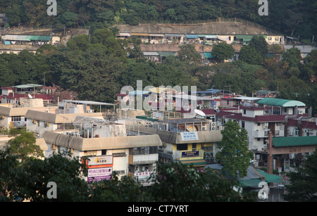 It's a photo of a village in Hong Kong, it's Hang Hau in Sai Kung, New territories. It's between Mountains and forest Stock Photo