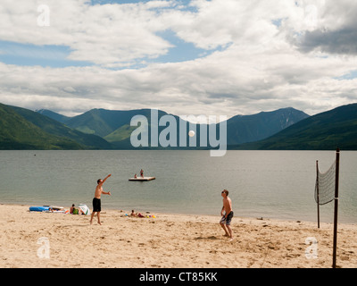 People on the beach in Nakusp on Upper Arrow Lake in British Columbia in Canada Stock Photo