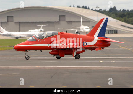BAE Systems Hawk T1 of the RAF Red Arrows display team taxiing on the runway at Farnborough. England.