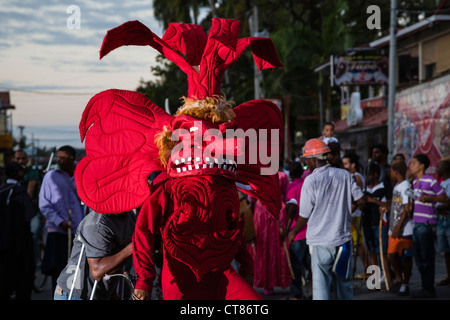 'Whipping Devils' patrol the streets during the Panamanian Carnival celebration on Isla Colon, Bocas del Toro, Panama. Stock Photo