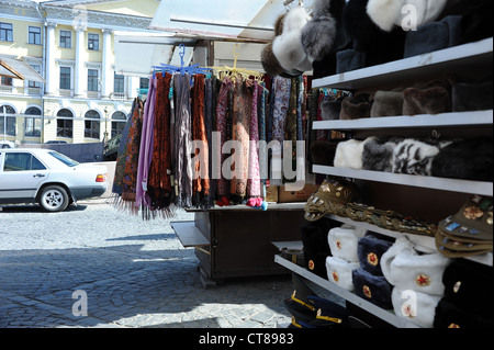 Russian hats and scarves on sale in St. Petersburg market . Stock Photo