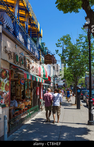 Bars, Cafes and Restaurants along Rue Saint-Denis in the Quartier Latin (Latin Quarter), Montreal, Quebec, Canada Stock Photo