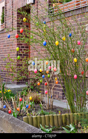 Shrub with Easter eggs Stock Photo