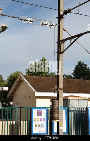 Pulley system used to tension overhead catenary or electric wires or lines on French railway, seen at Survilliers-Fosses France Stock Photo