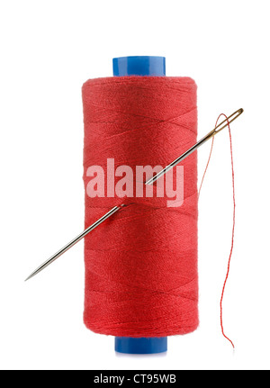 Spool of red thread and needle isolated on white Stock Photo