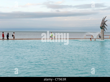 Man-made saltwater lagoon at the Esplanade of the tourist destination Cairns in Far North Queensland, Australia Stock Photo