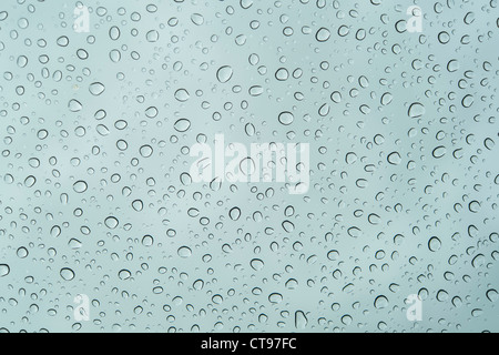 Close Up of Raindrops on a Car Window. Stock Photo
