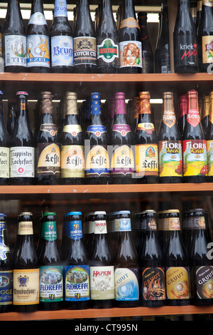 Bottles of Belgian beer on display in a shop window Ghent Belgium Stock Photo
