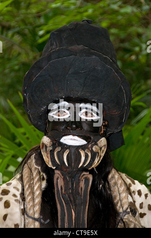 A Maya actor/dancer in Lord of Cacao (Dios del Cacao or IK Chuah) dress (costume) at the Riviera Maya's Xcaret Park in Mexico. Stock Photo