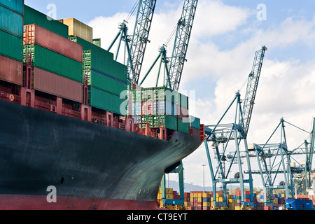 Cargo Ship Loading Containers Stock Photo