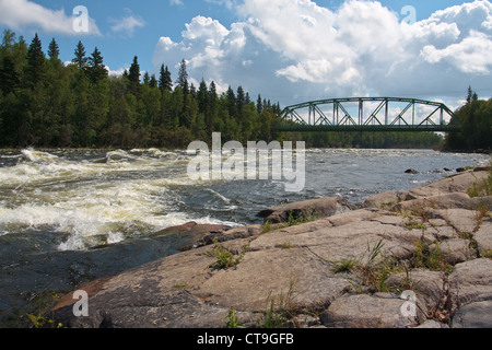 The bridge at Otter Rapids on the Churchill River in Northern Saskatchewan, Canada. Stock Photo