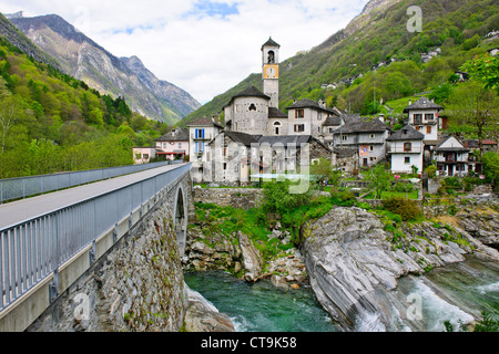 Lavertezzo,Helicopter Delivering Material to Hillside House above Village,Val Verzasca,Verzasca River,Ticino,Switzerland Stock Photo